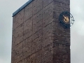 The clock tower includes two chimneys for functional wood burning fireplaces which are still in use. The clock is off-center because Eliel Saarinen likened it to a pocket watch.