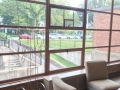 Original (reupholstered) Saarinen designed chairs are in the lobby, with a Burlini kinetic sculpture. These windows were replaced, changing from single pane to thermopane and with screens added. The new windows were made by the same company who made the originals.