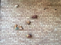 Original ceramics by Lily Swann Saarinen adorn the walls inside and out