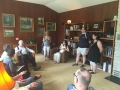 The large living room had an unusual ceiling detail and the original wood panelling. The current owner at left of Joan Gand.