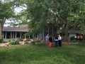 The owners planted the stately Elm tree that shades the screen porch over 40 years ago.