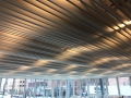 Ceiling system hides lighting