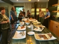 Enjoying snacks in the beautiful kitchen with one of our hosts (in the striped shirt at right) and Charles Woods, who was Dennis Blair's apprentice (in the blue checked shirt at left)